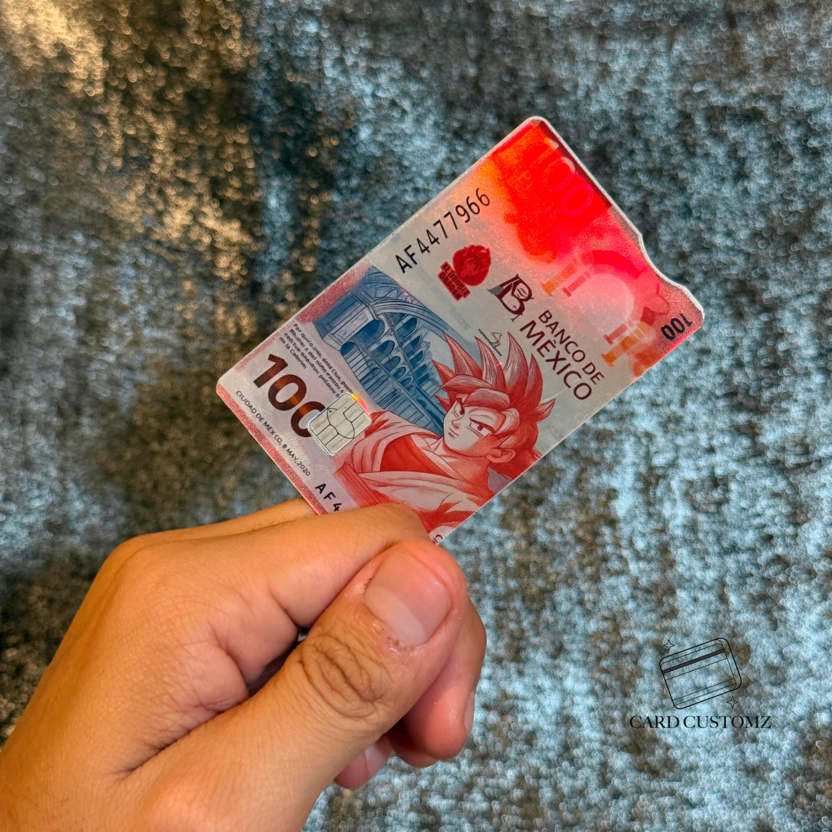BILLETE DE GOKU STICKER DE VINIL HOLOGRÁFICO PARA TARJETAS